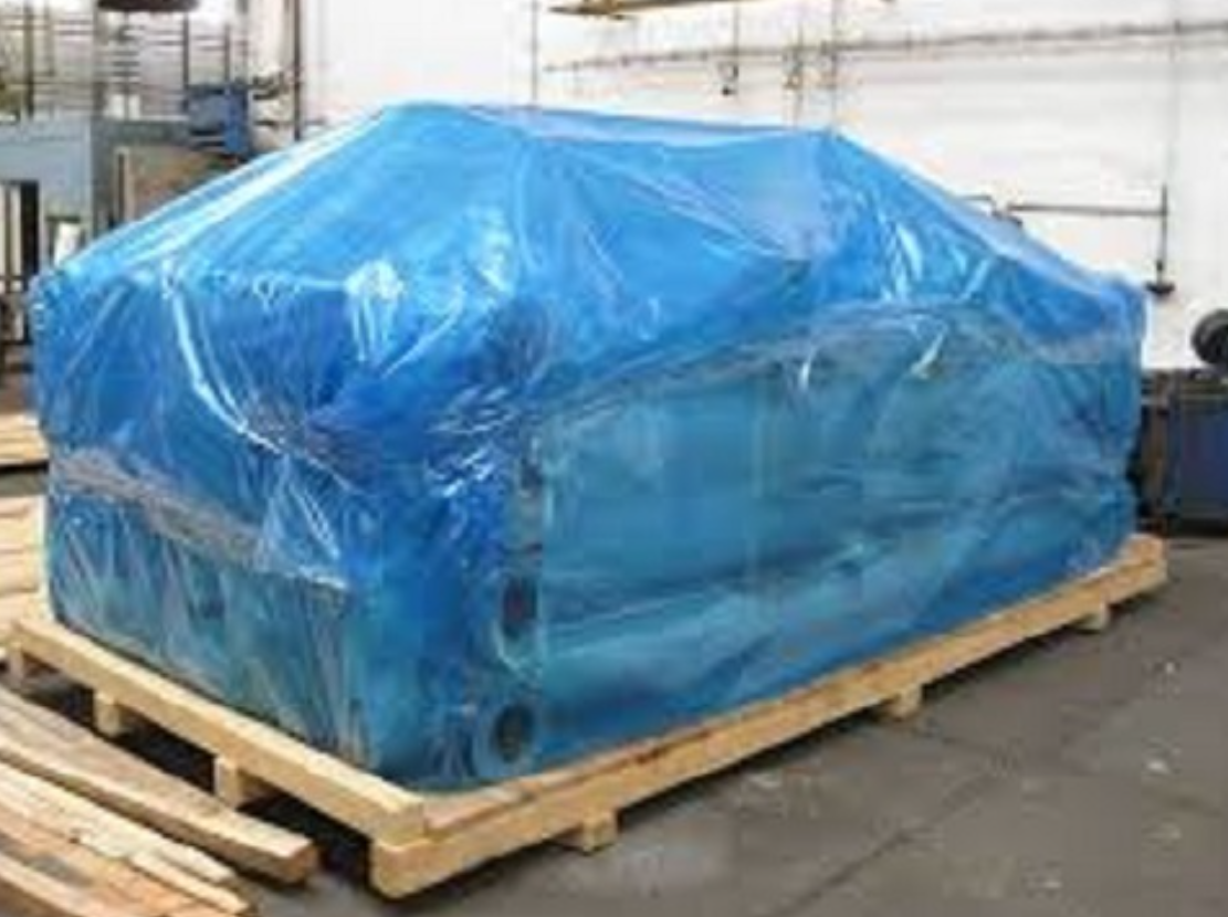 Large equipment wrapped and palletized on the plant floor by Bolstyn Packaging